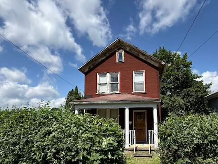 Before renovation exterior of an Avoca PA property purchased by House Buying Solutions PA